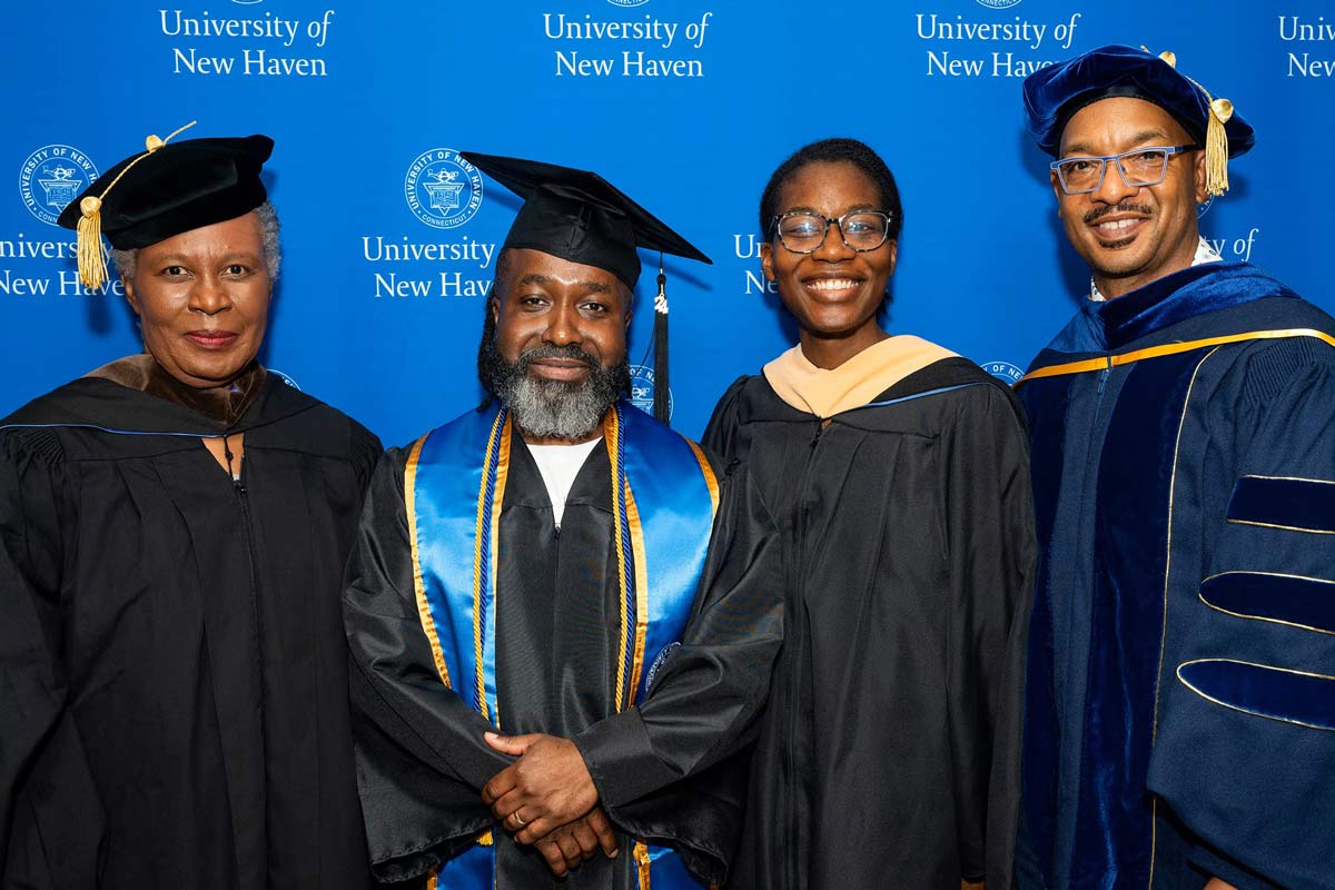 Four MacDougall-Walker graduates from the Yale Prison Education Initiative at Dwight Hall and the University of New Haven (UNH)